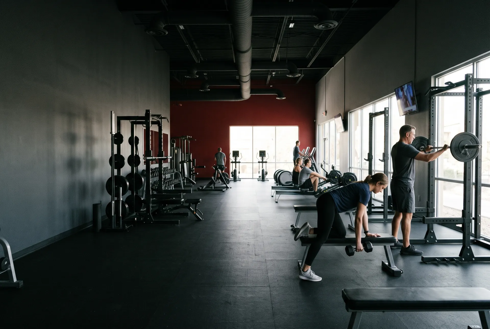 Members training on the strength floor at a Peregrine Fitness club in Las Vegas in the morning